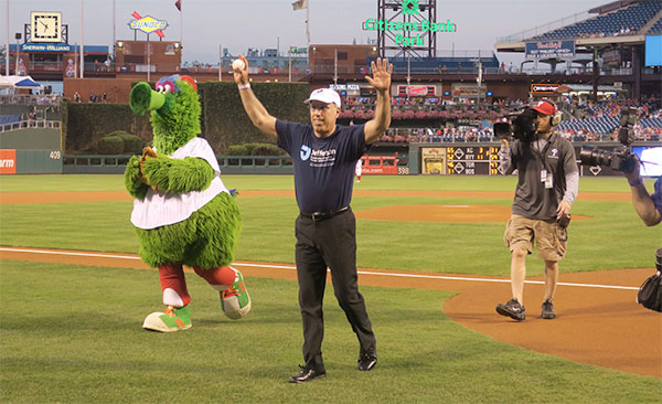 Chancellor Spinelli Throws Out First Pitch at Phillies Game